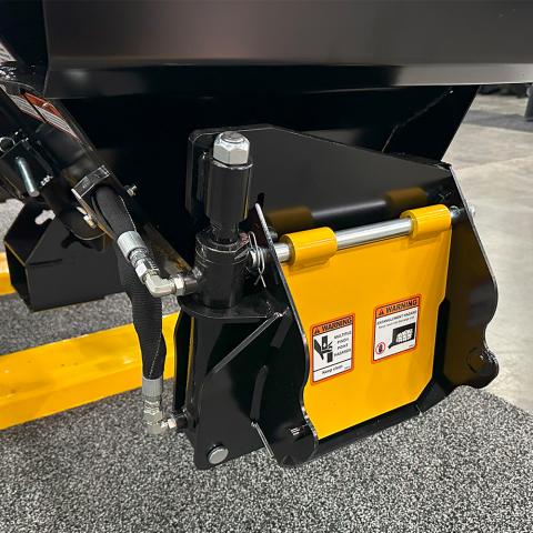 Image showing close-up of Danuser Mega Mixer hydraulic gate with hoses, fittings, and warning labels for pinch and entanglement hazards