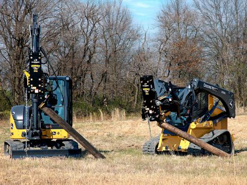 Image shows Danuser Hornet T8-RR on a John Deere 333G Skid Steer and 50P Excavator holds tilted posts with grapples in grassy field with trees