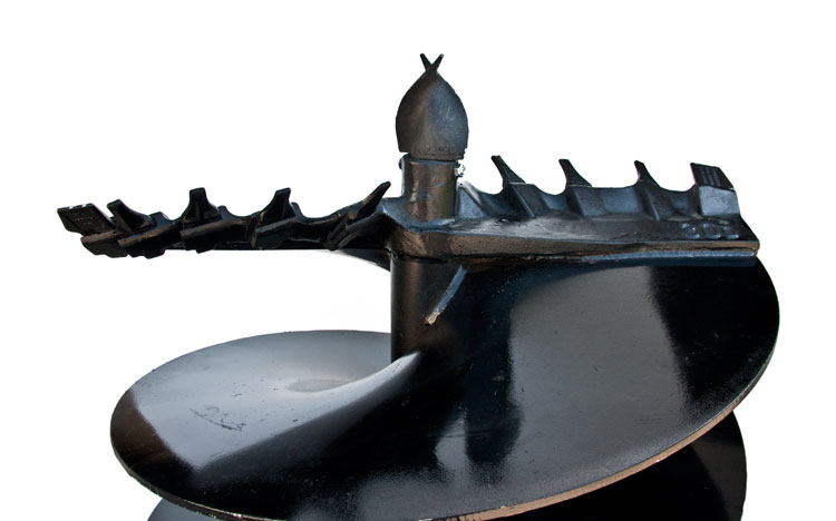 Tip of cast auger showing tip and cutting edges