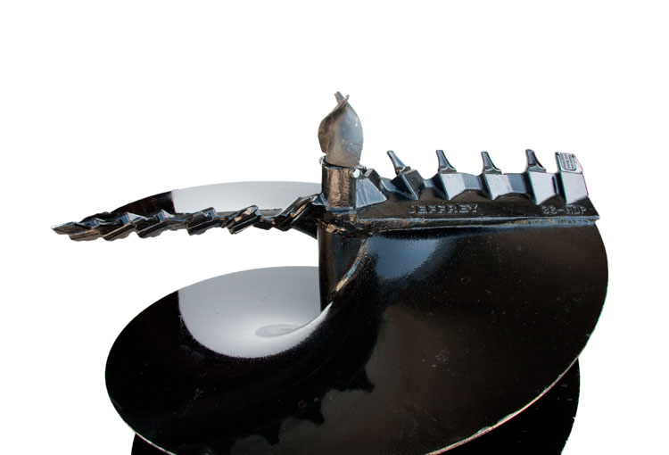 Tip of cast auger showing tip and cutting edges