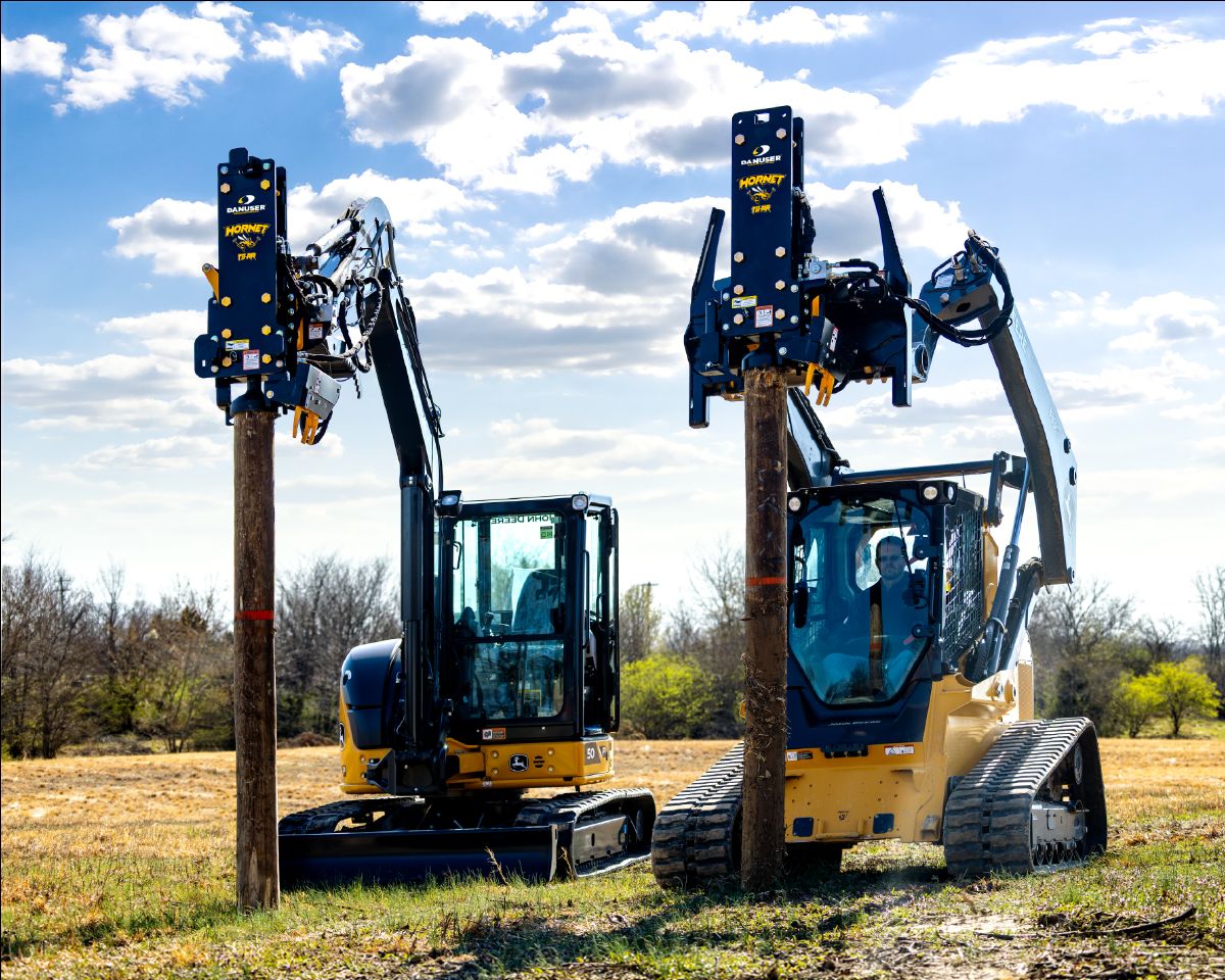 Hornet post driver on John Deere Excavator next to a Hornet post driver on a John Deere Skid-Steer both with wooden posts underneath